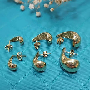 Brinco Gota Vazado com Forro Colmeia em Ouro 18k